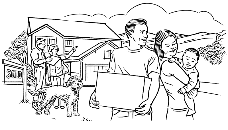 Family outside their new home on moving day.